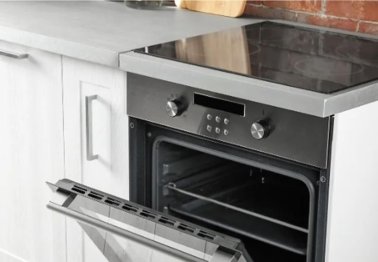 A wall oven with its door open